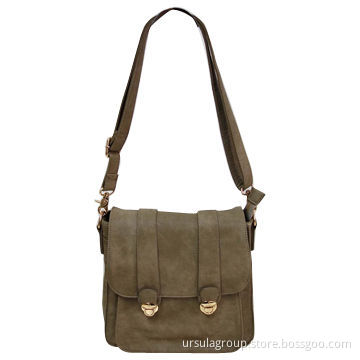 Cross bag with two lock closures on front flap